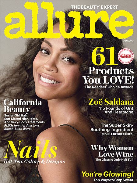 Zoe Saldana poses nude for Allure magazine .